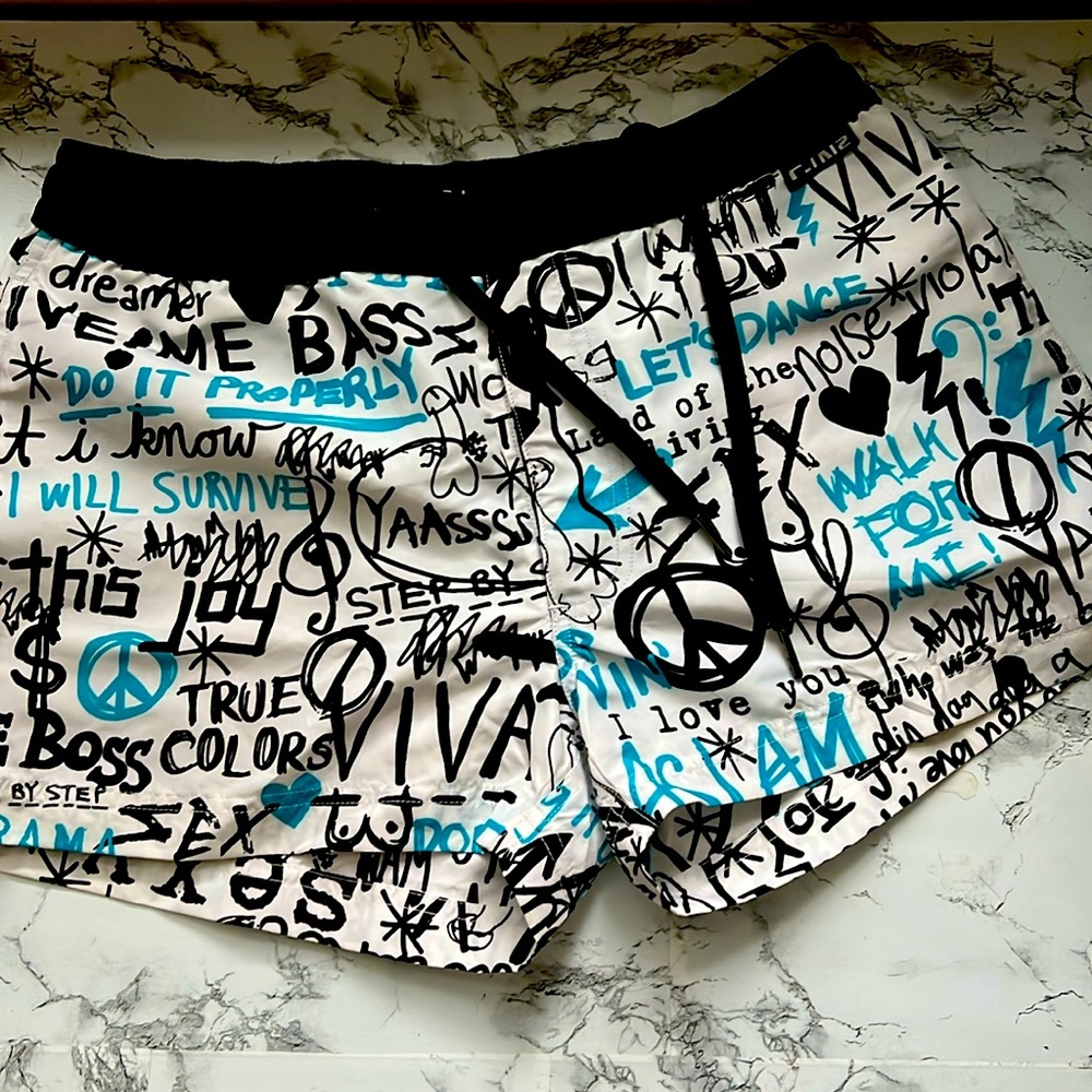 Never worn swim shorts size small with tags.